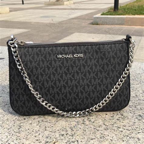 pochete michael kors original|michael kors pouchette crossbody.